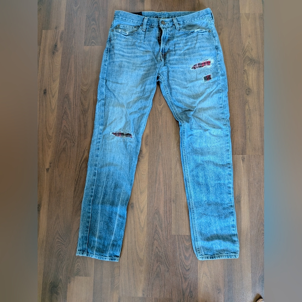 Hollister Light Blue Classic Taper Jeans with Red Plaid Patch Details